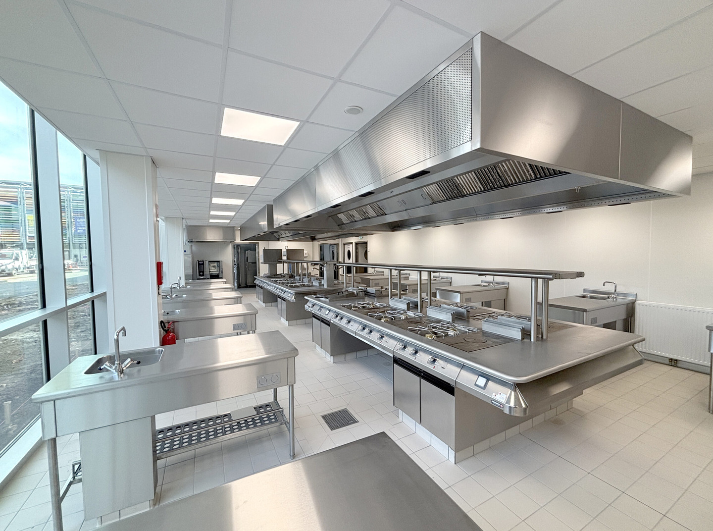 Professional culinary training kitchens at CCI Le Mans Sarthe equipped with Halton commercial kitchen ventilation systems in Le Mans, France